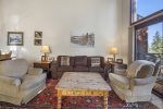 Mammoth Condo Rental Meadow Ridge 24: Living room chairs, gas fireplace, views of Mammoth Mountain